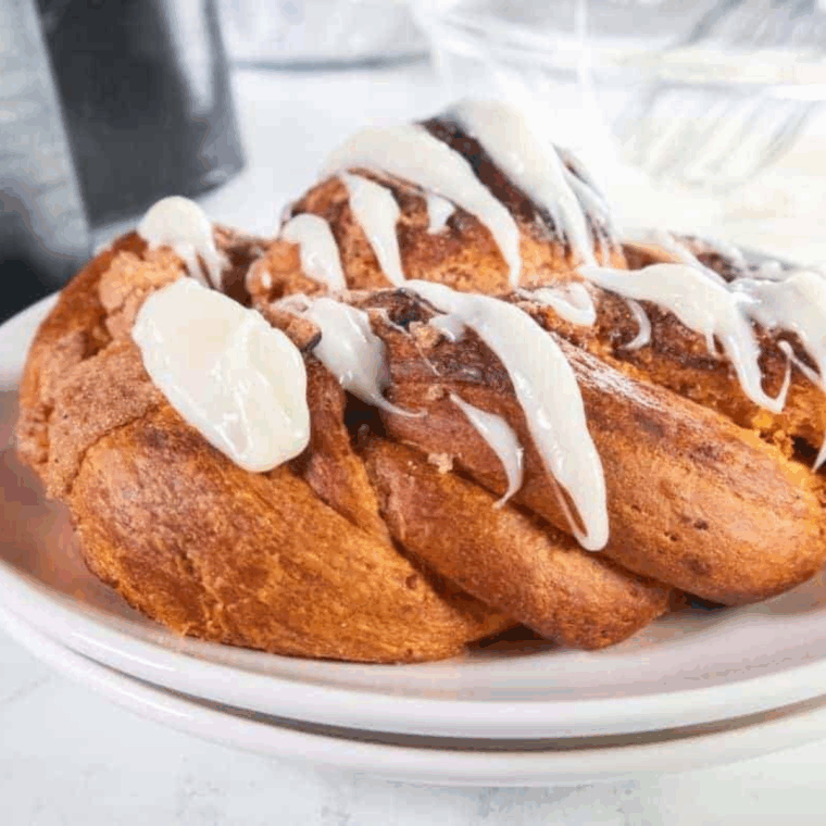golden brown pumpkin spice bread twist fresh from the air fryer with a dusting of cinnamon sugar