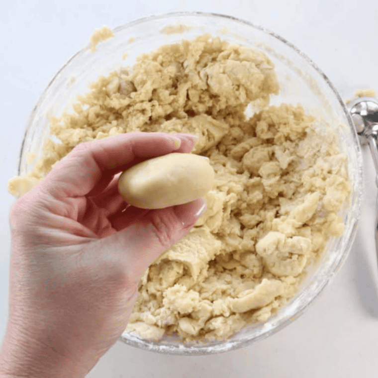 Rolling Air Fryer Lofthouse cookie dough into 2-inch balls.