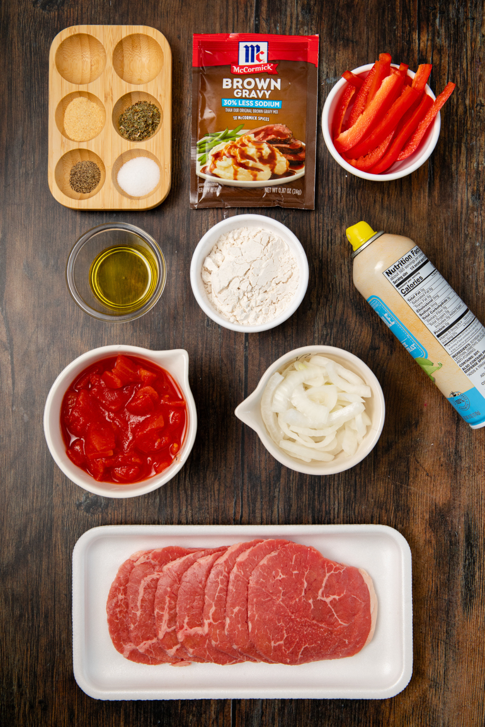 Ingredients needed for air fryer cube steak on kitchen table.