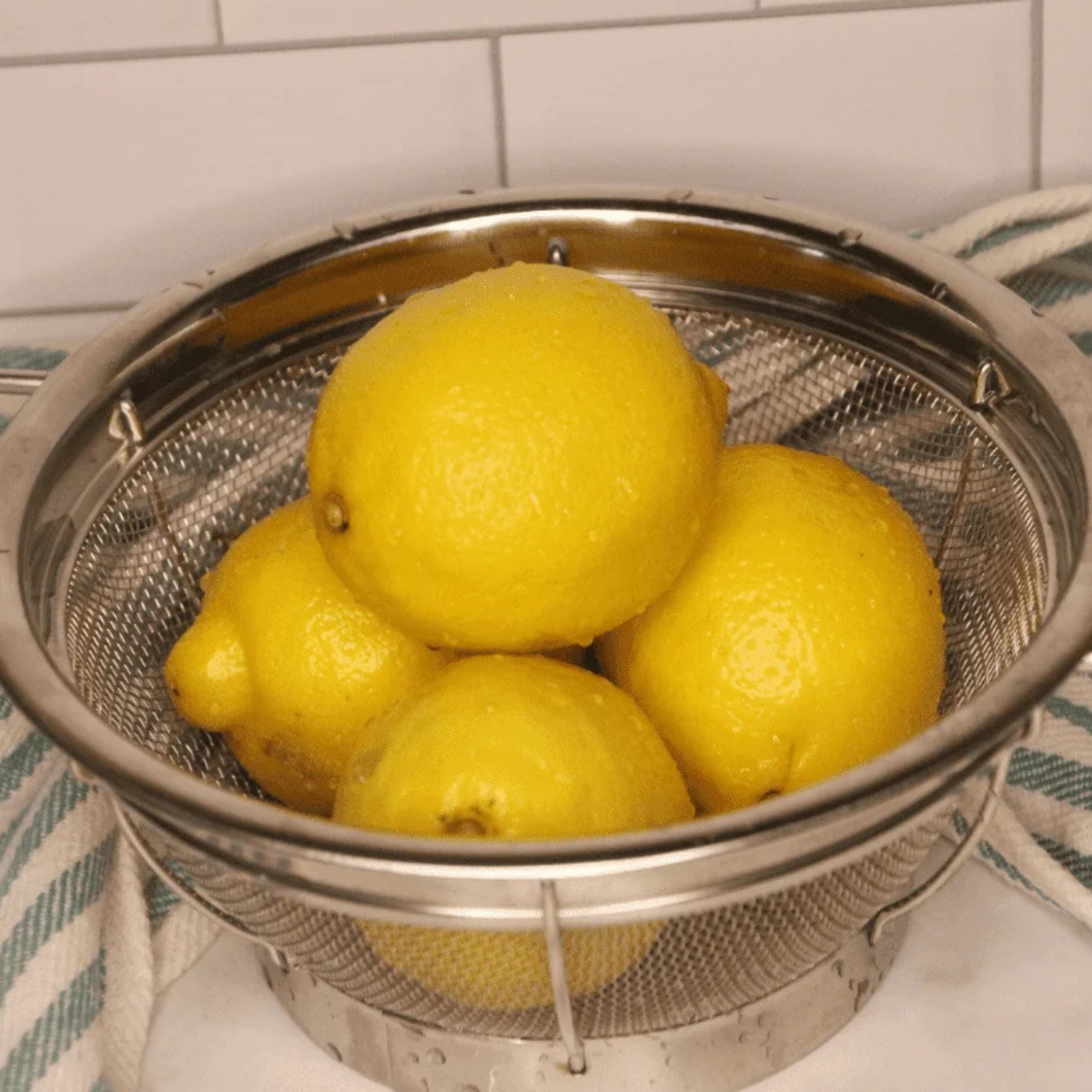 Ingredients needed for Dehydrated Lemon In Air Fryer on kitchen table.