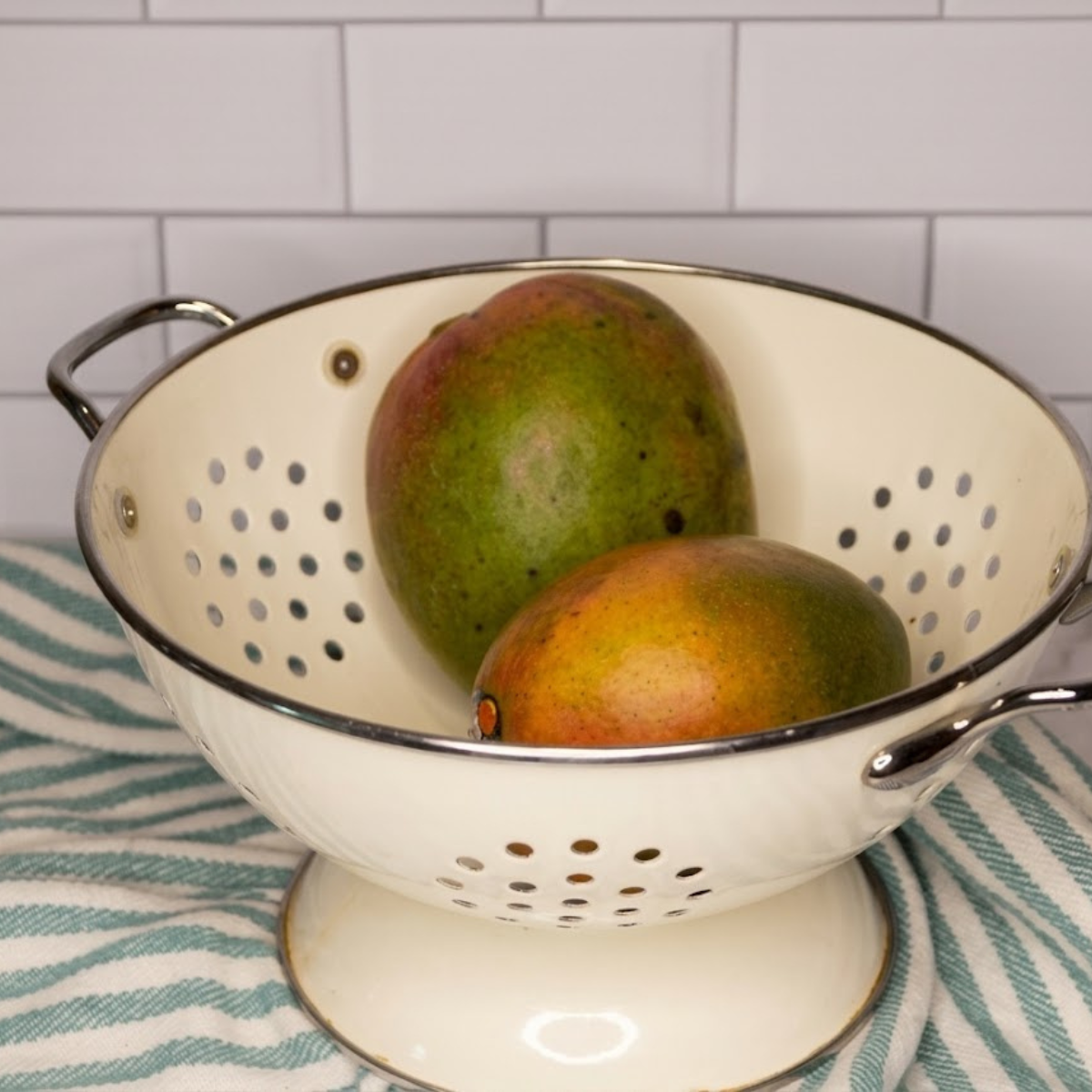 Ingredients needed for Dehydrated Mangoes In Air Fryer on kitchen table.