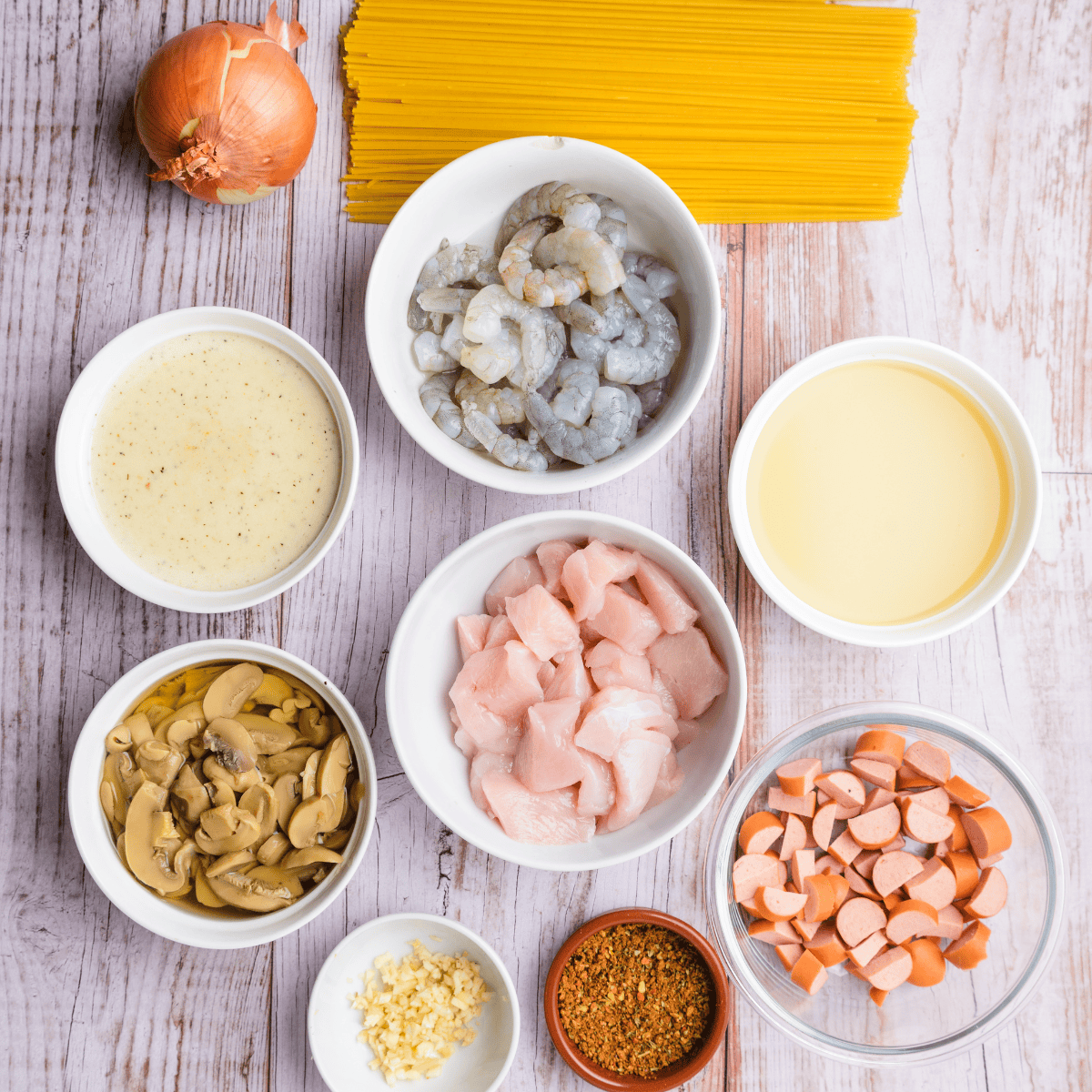 Ingredients needed for Easy Bubba Gump Cajun Shrimp Recipe on kitchen table.