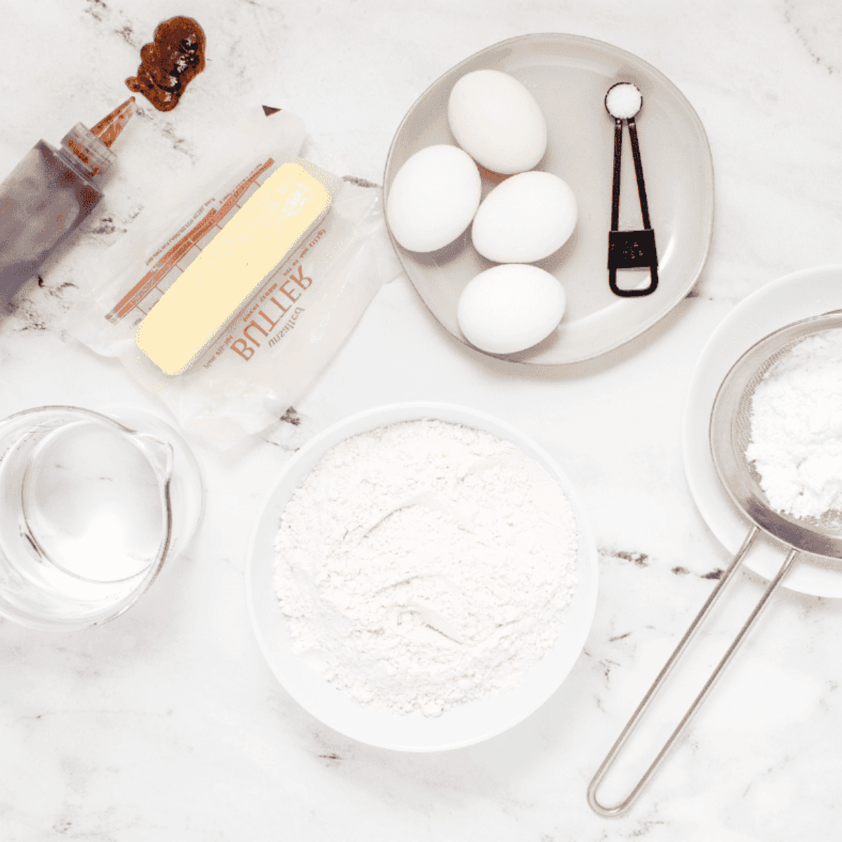 Ingredients needed for Air Fryer Sufganiyot (Israeli Donuts)
on kitchen table.
