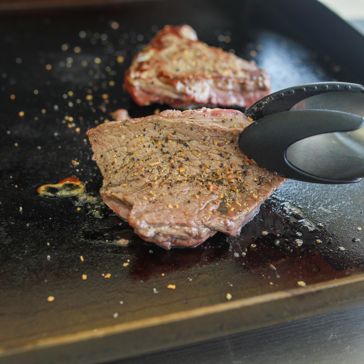 Blackstone Air Fryer Griddle Combo review showing flat top griddle and built-in air fryer drawers