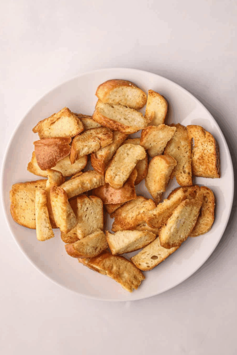 Bagel chips on plate.