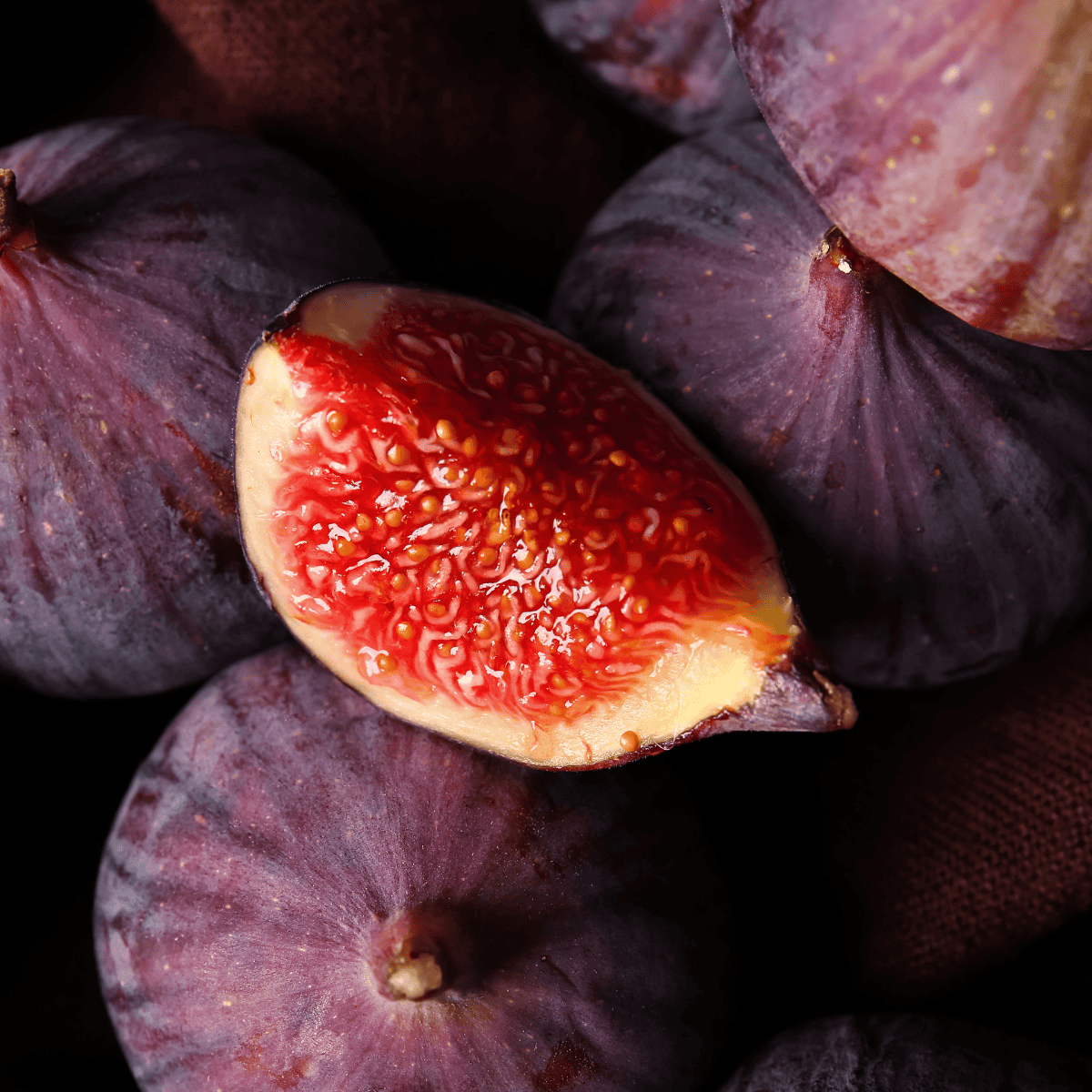 Ingredients for air fryer roasted figs — fresh figs, honey, and ground cinnamon