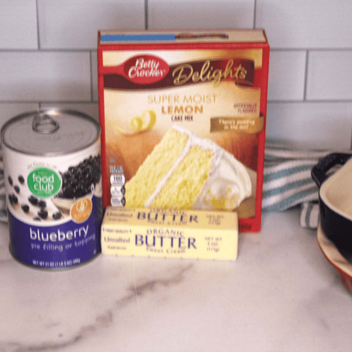 Easy Air Fryer Blueberry Dump Cake ingredients on kitchen table.