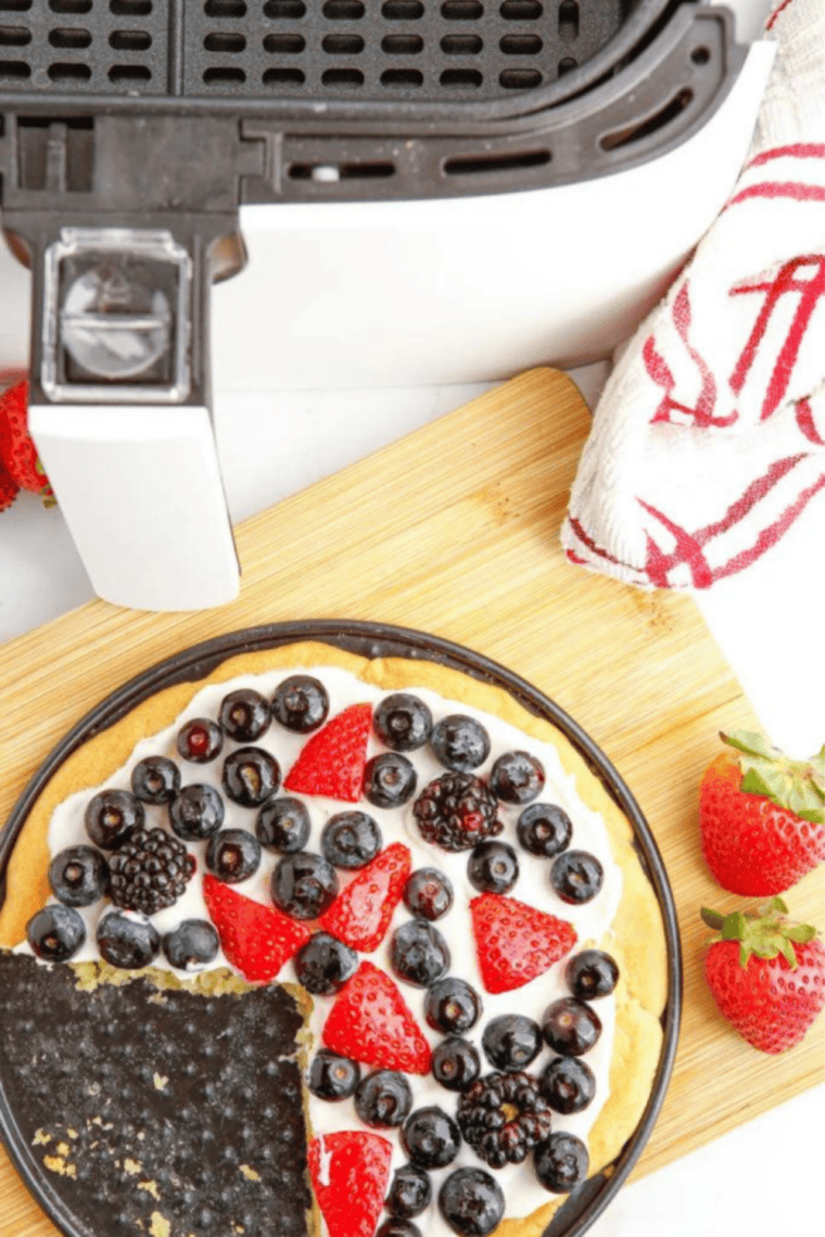 Air Fryer Sugar Fruit Pizza – soft, golden sugar cookie crust topped with creamy frosting and fresh, colorful fruit. Quick, easy, and perfect for parties, snacks, or dessert.