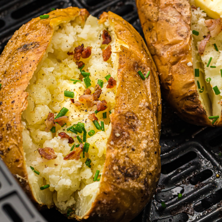 Close up of Air Fryer Steakhouse Potatoes in the air fryer basket.