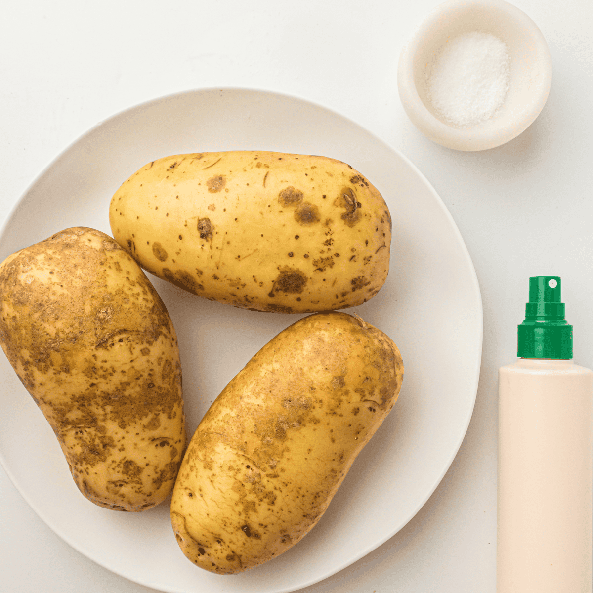 Ingredients needed for Easy Air Fryer Steakhouse Potatoes on kitchen table.