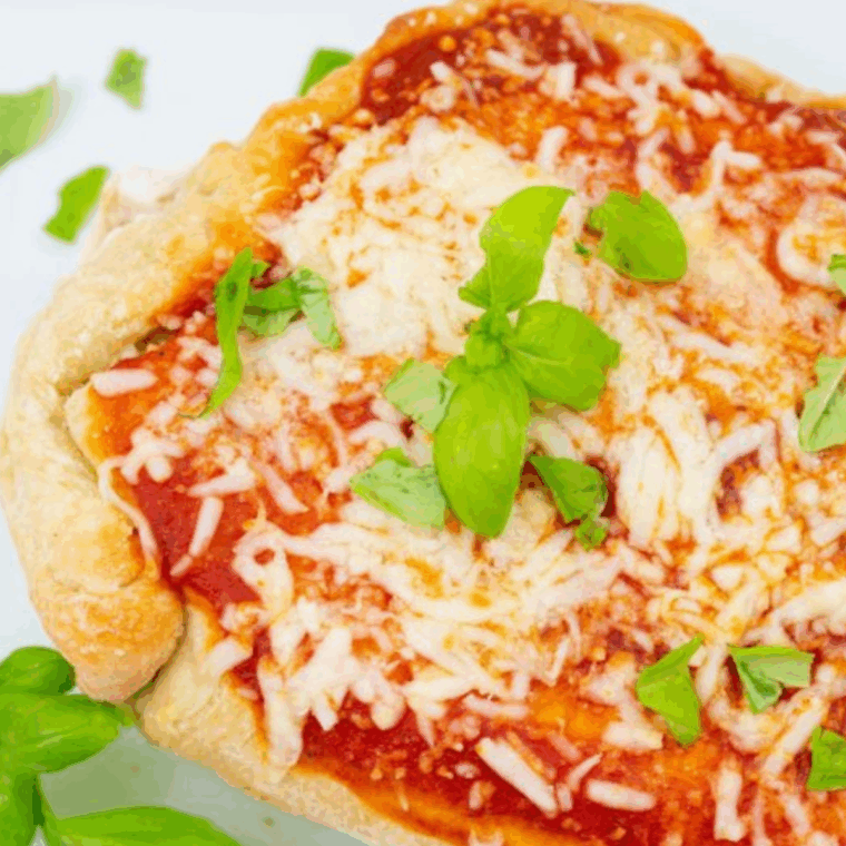 Air Fryer Chicken Parmesan Calzone with golden crust, stuffed with juicy chicken, marinara sauce, and melted cheese.