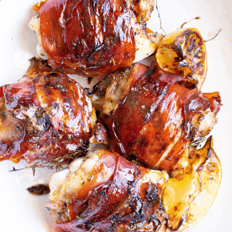 Air fryer bacon wrapped chicken thighs made with boneless thighs