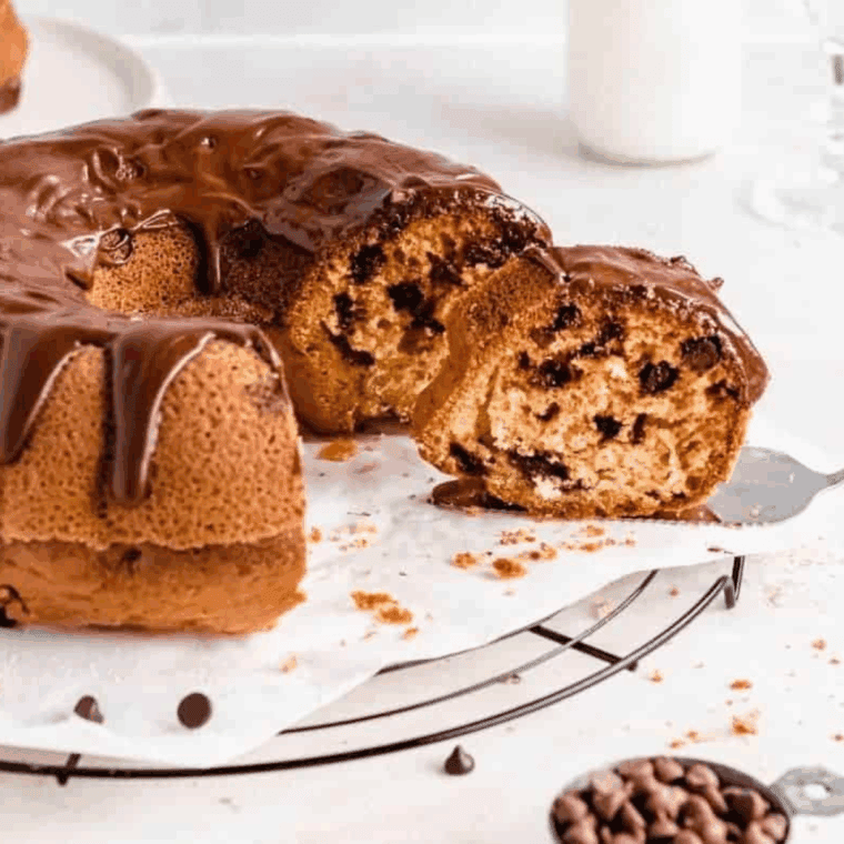 Golden chocolate chip bundt pound cake made in an air fryer, sliced and ready to serve.