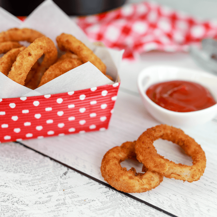 Air fryer Red Robin onion rings served with copycat campfire sauce and spicy ketchup