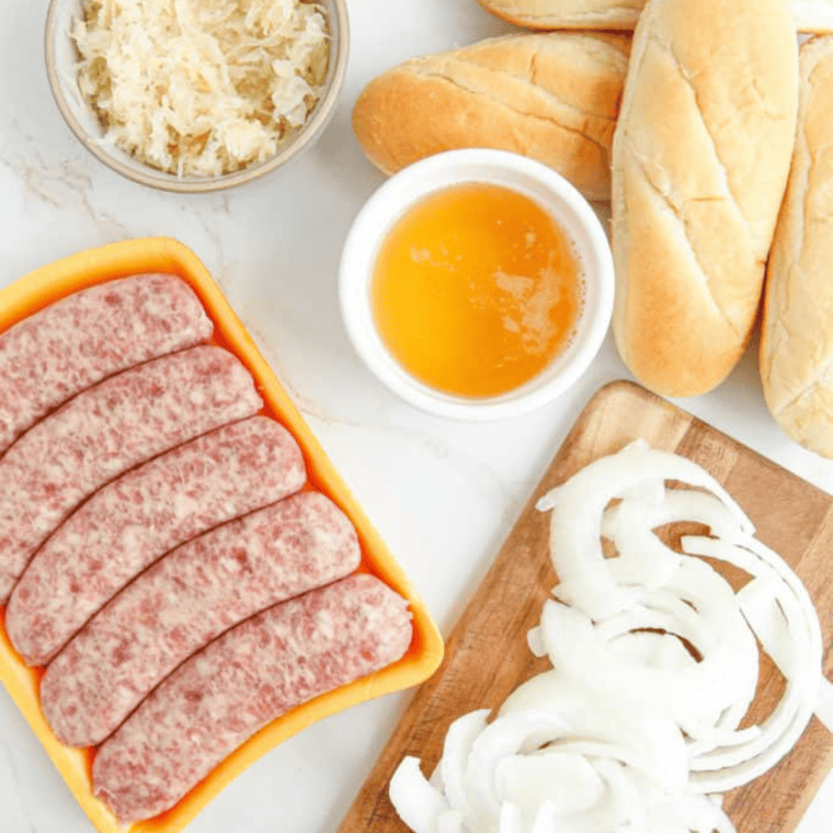 Frozen bratwurst, brat buns, and butter on a counter
