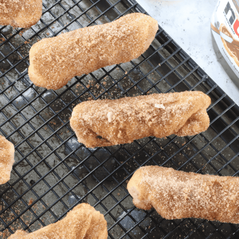 Air fryer churros stuffed with Nutella and coated in cinnamon sugar