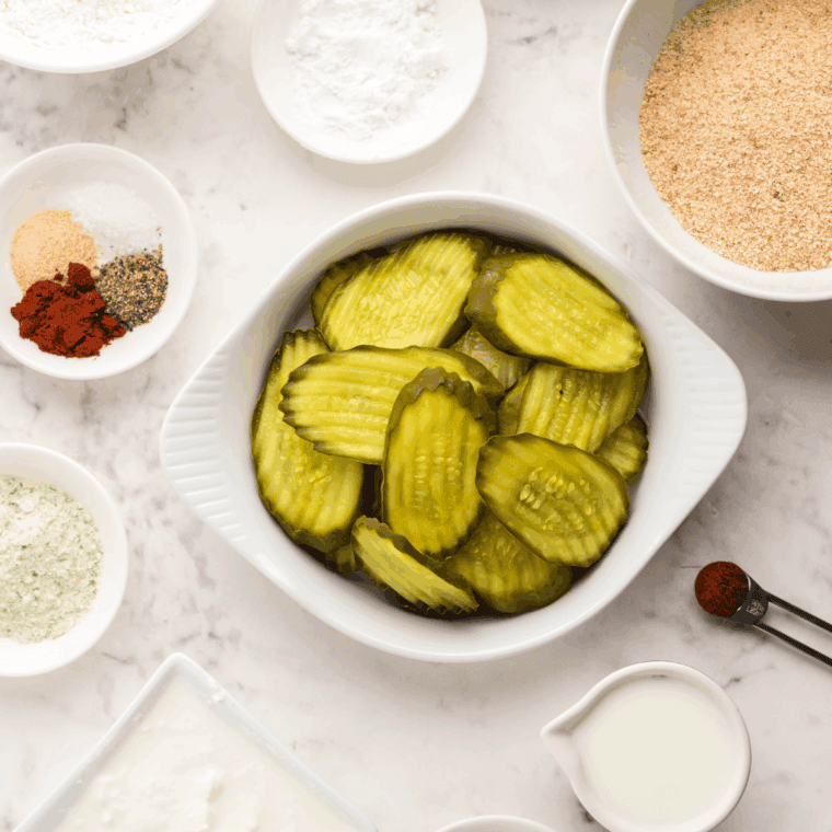 Ingredients for air fryer Hooters fried pickles: dill pickles, flour, eggs, buttermilk, breadcrumbs, and spices