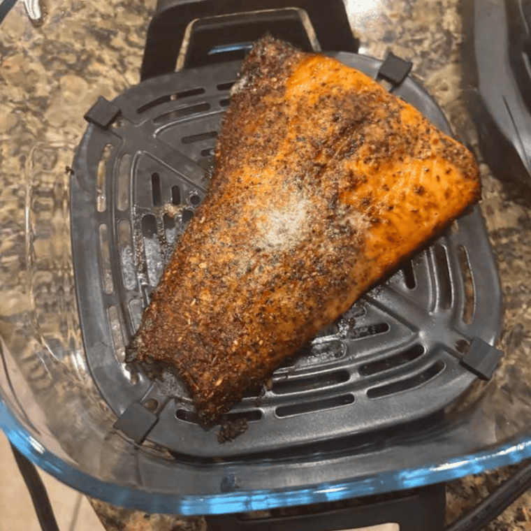 crispy golden salmon fillet cooked in Ninja air fryer on plate