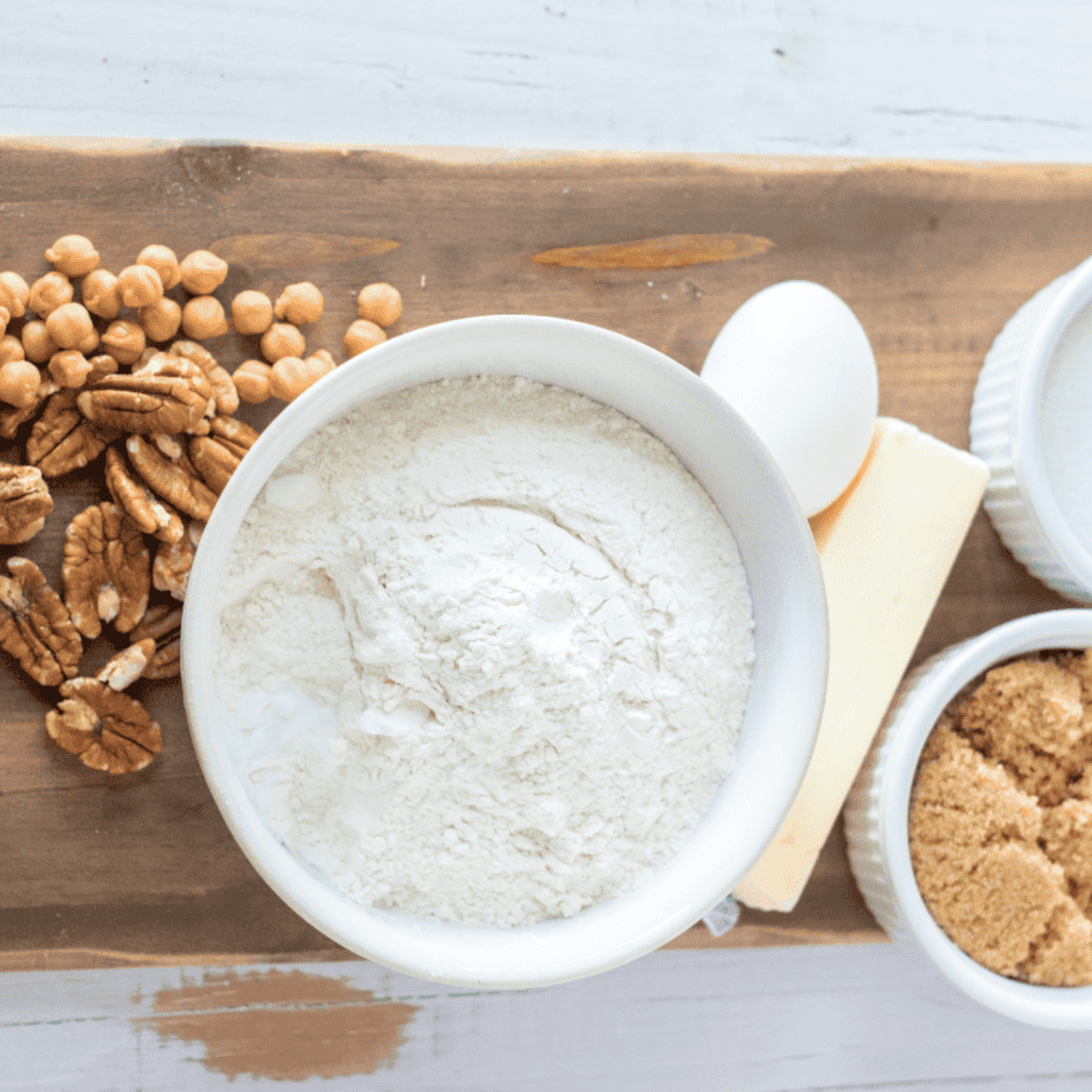 Ingredients needed for Giant Caramel Pecan Air Fryer Cookie on kitchen table.
