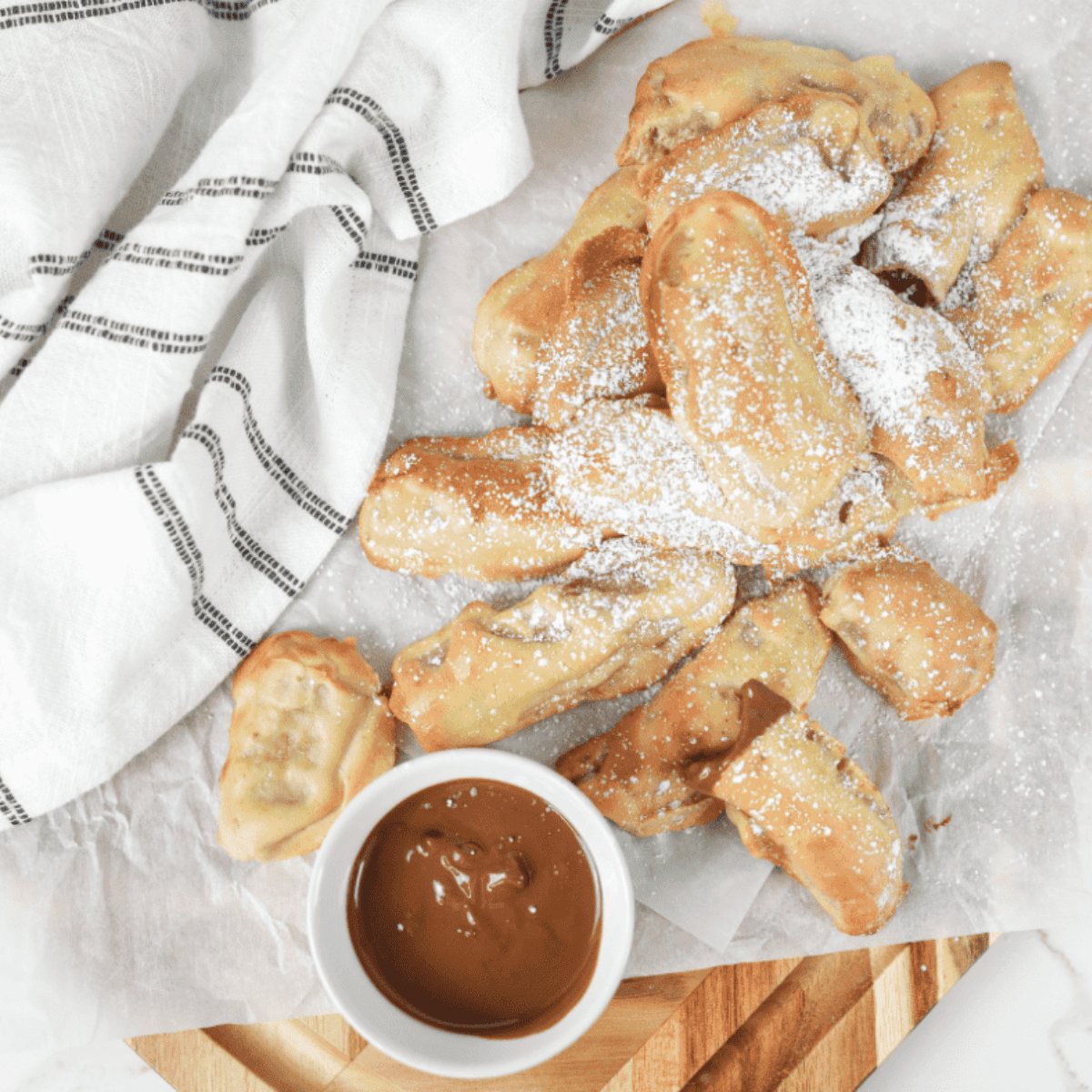 Air Fryer Banana Pancake Dippers golden brown and ready to serve with chocolate or maple syrup