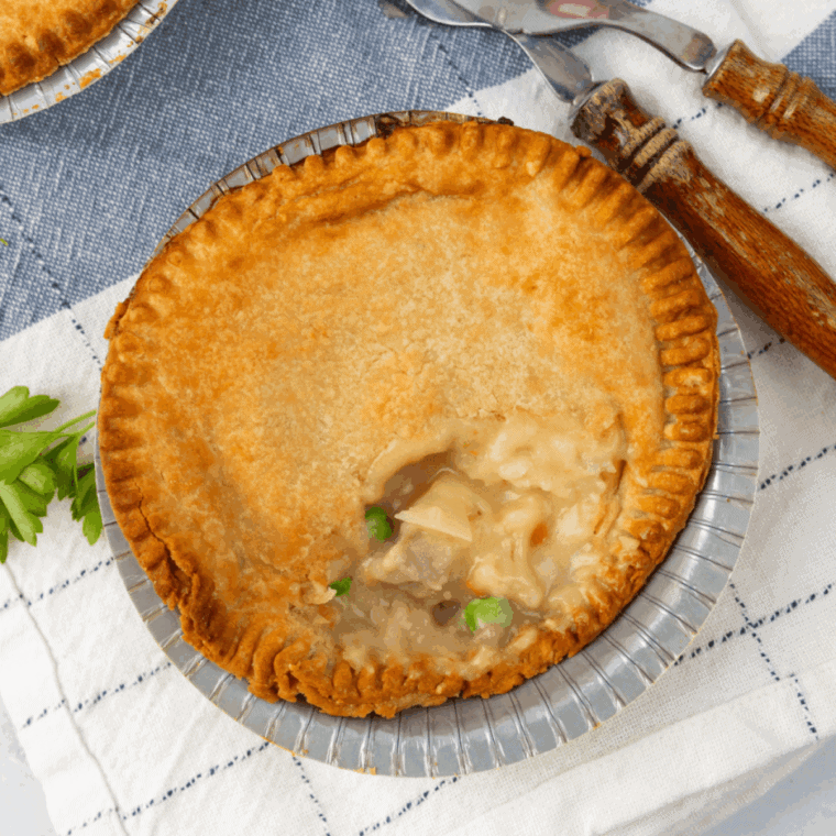 Cooked Banquet Turkey Pot Pie Air Fryer on kitchen table.