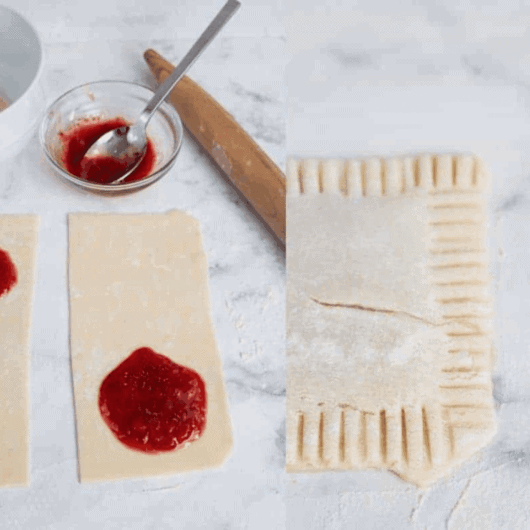 The image is cut into 2 down the middle. On the left side, there are 2 rectangles of pastry sitting on a white marble counter, with a blob of jam at one end. There small glass jar containing the preserve is on the counter with a teaspoon inside it. On the right side, there is another rectangle piece of pastry with the design of imprinted lines around the perimeter.