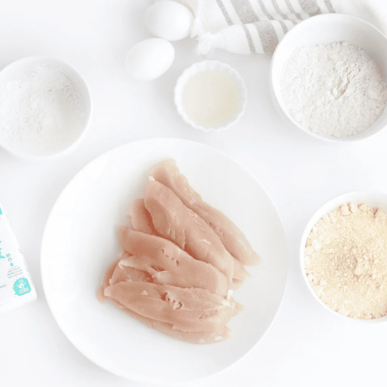 Ingredients for cornbread crusted chicken tenders: chicken tenderloins, buttermilk, Jiffy corn muffin mix, flour, and spices
