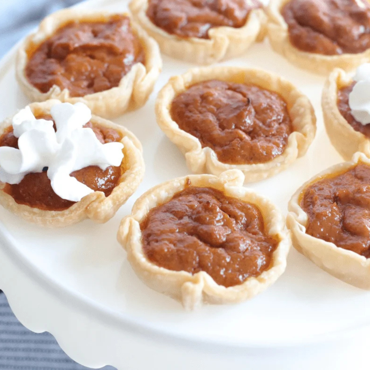 Air fryer pumpkin tarts cooling on a wire rack