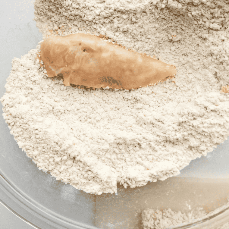 Whisking a cornstarch slurry into the Jack Daniel's glaze to thicken it in the pan