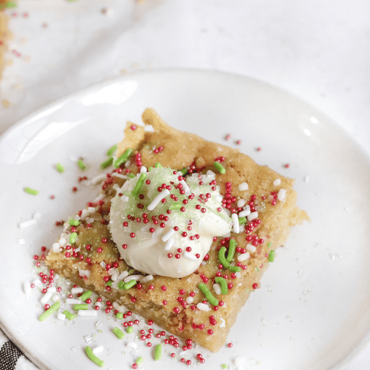 Golden, soft sugar cookie bars fresh from the air fryer, cut into squares and ready to serve.