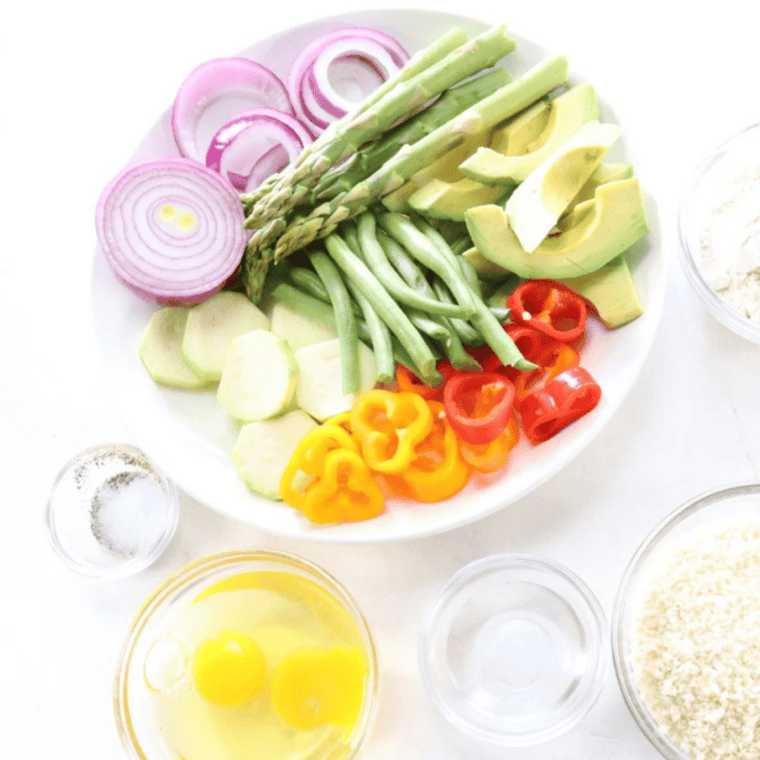 Ingredients for air fryer vegetable tempura including flour, cornstarch, panko, egg, club soda, and sliced vegetables