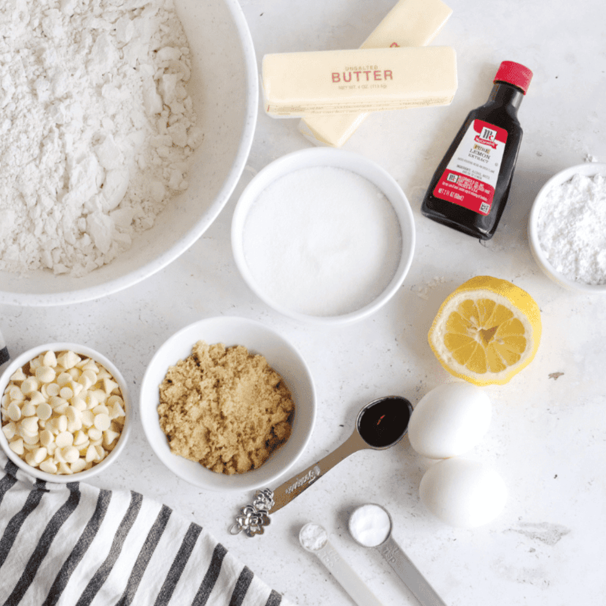 Ingredients needed for Air Fryer White Chocolate Chip Lemon Cookies on kitchen table.