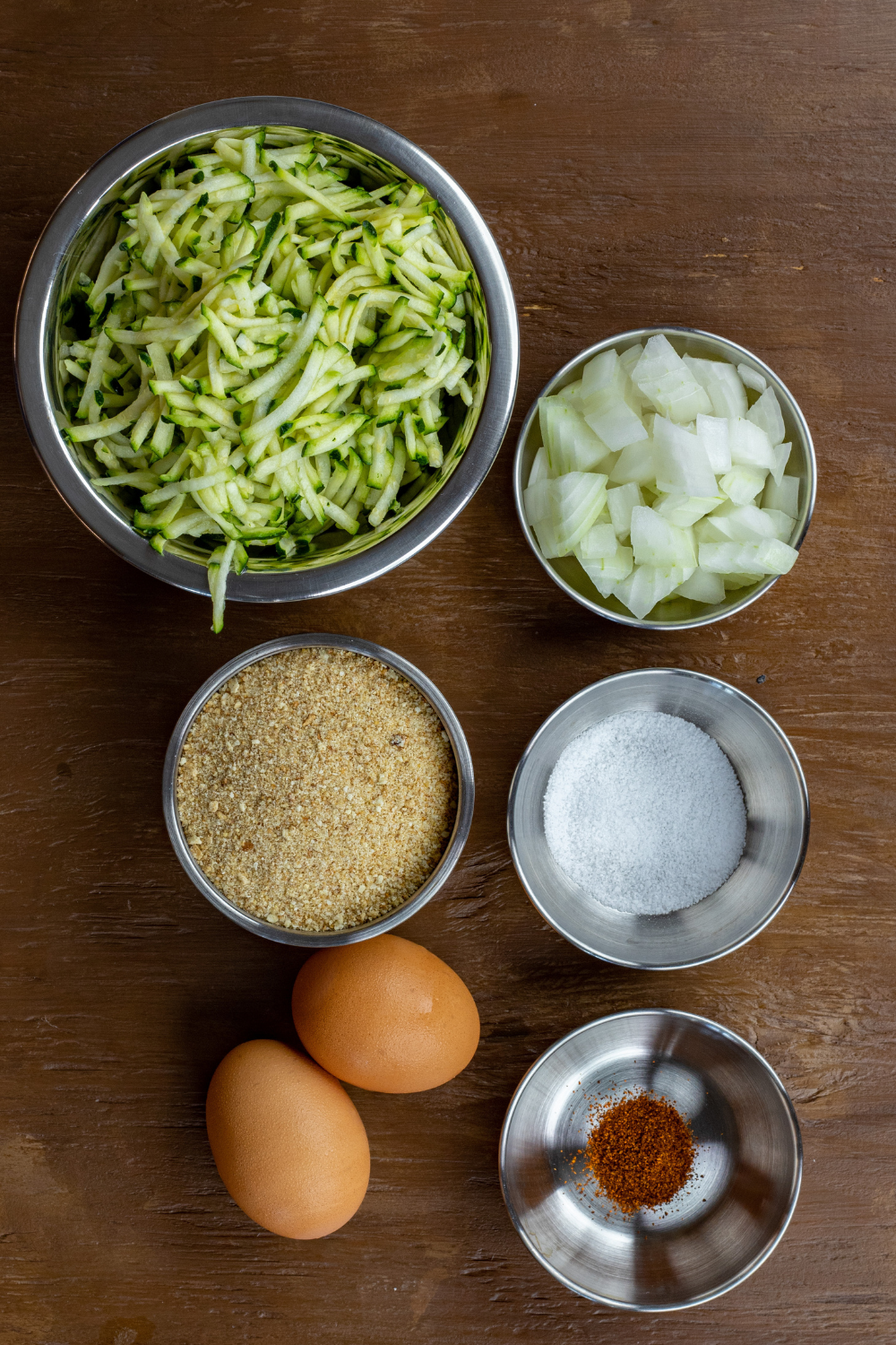 Ingredients needed for Air Fryer Zucchini Burgers (Crispy & Holds Together!) on kitchen table.
