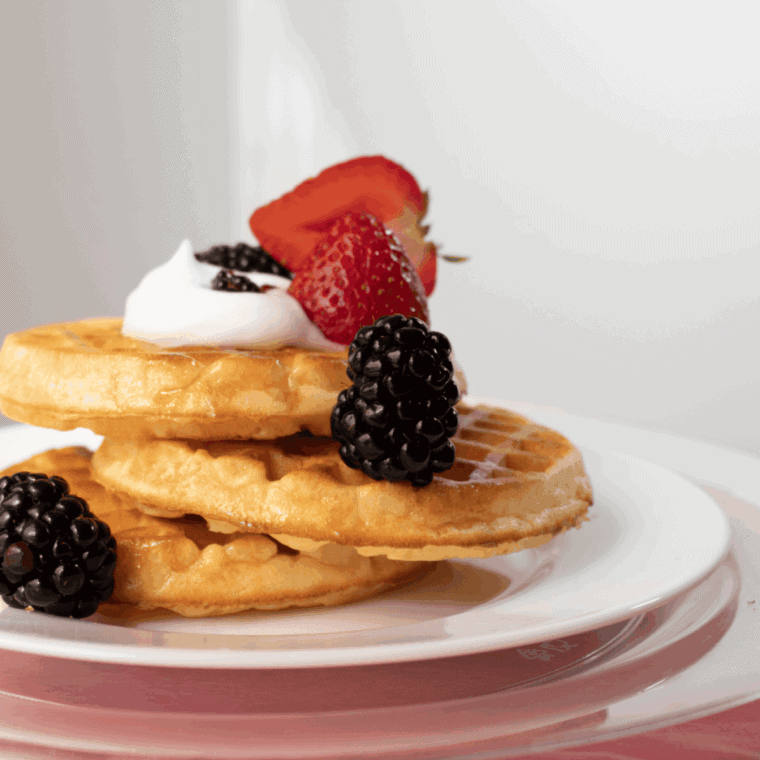 Dairy-free waffles made without milk, golden and fluffy on a plate