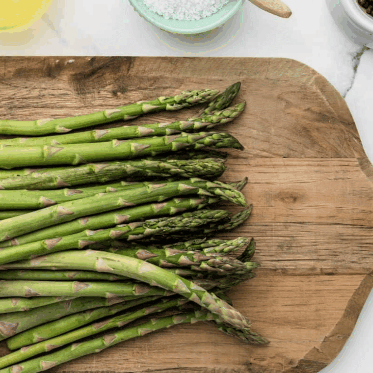 Ingredients needed for Easy Ninja Foodi Grill Asparagus Recipe on kitchen table.