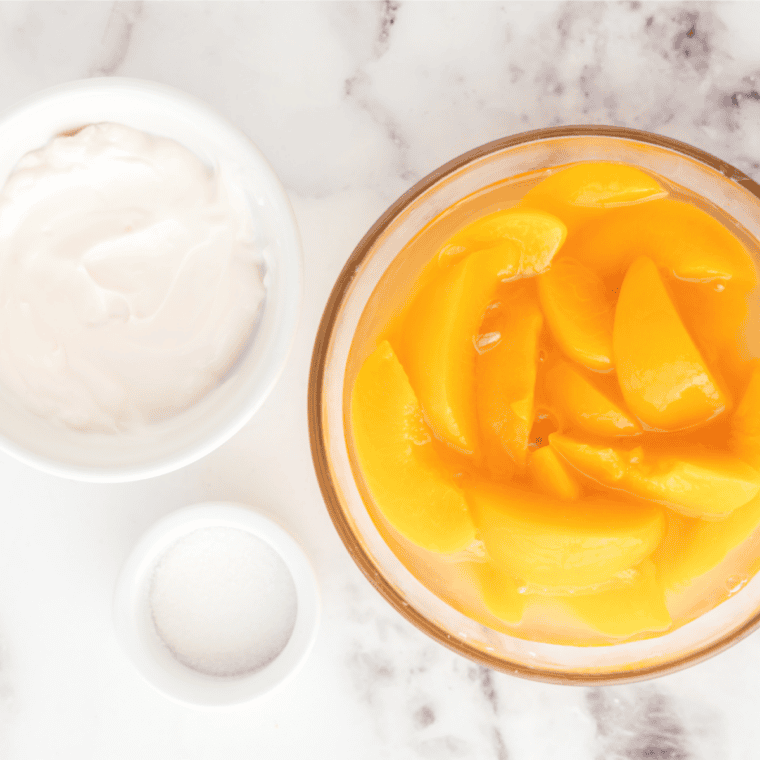Ingredients needed for No Sugar Added Ninja Creami Peach Ice Cream on kitchen table.