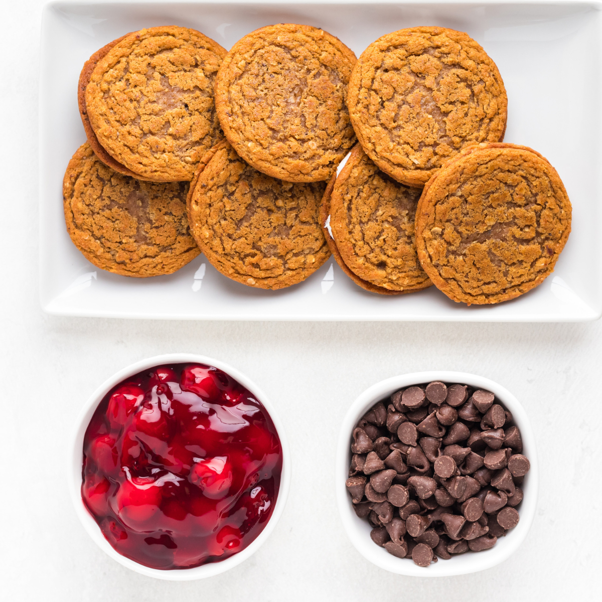 Ingredients needed for Air Fryer Cherry Oatmeal Pies on kitchen table.