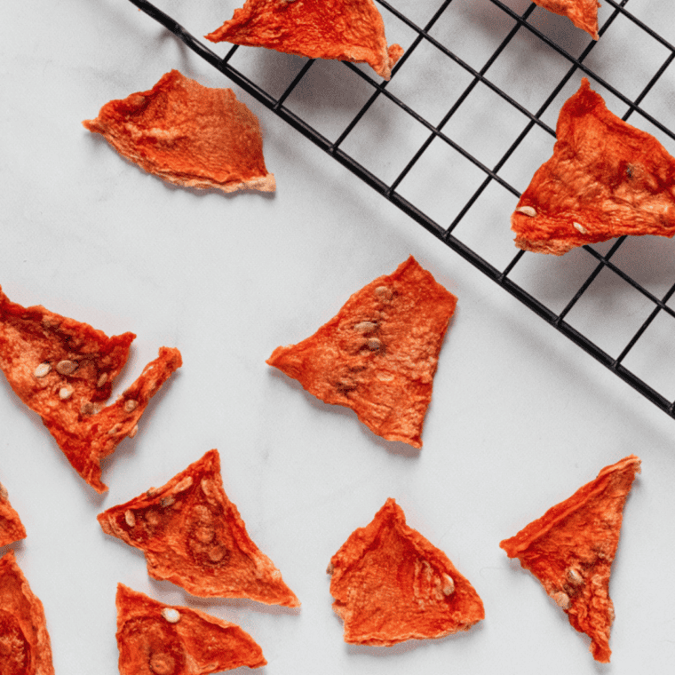 A plate of chewy air fryer dehydrated watermelon, also called watermelon candy.