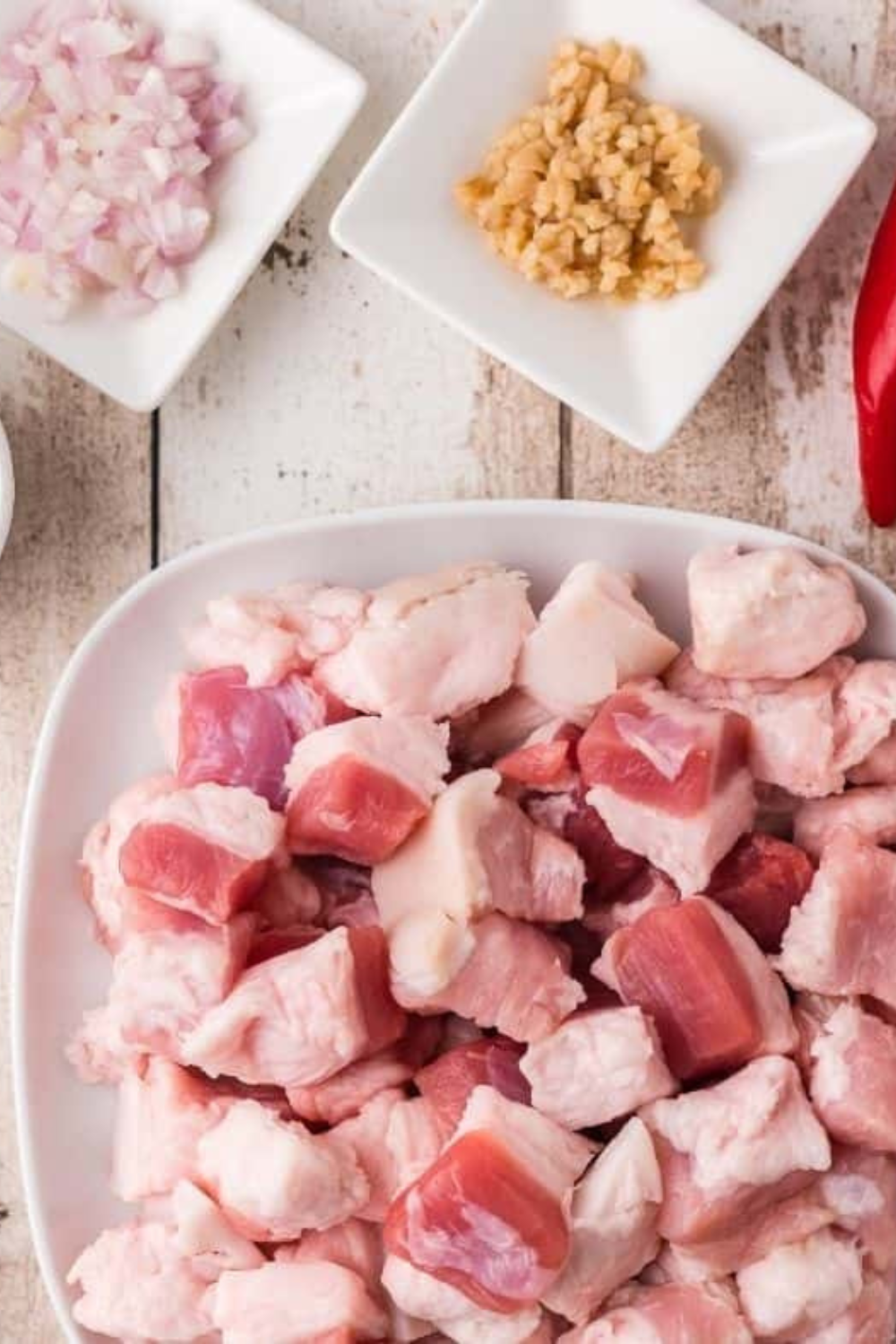Ingredients for air fryer frozen pork belly: pork belly, olive oil, brown sugar, paprika, garlic powder, salt, pepper