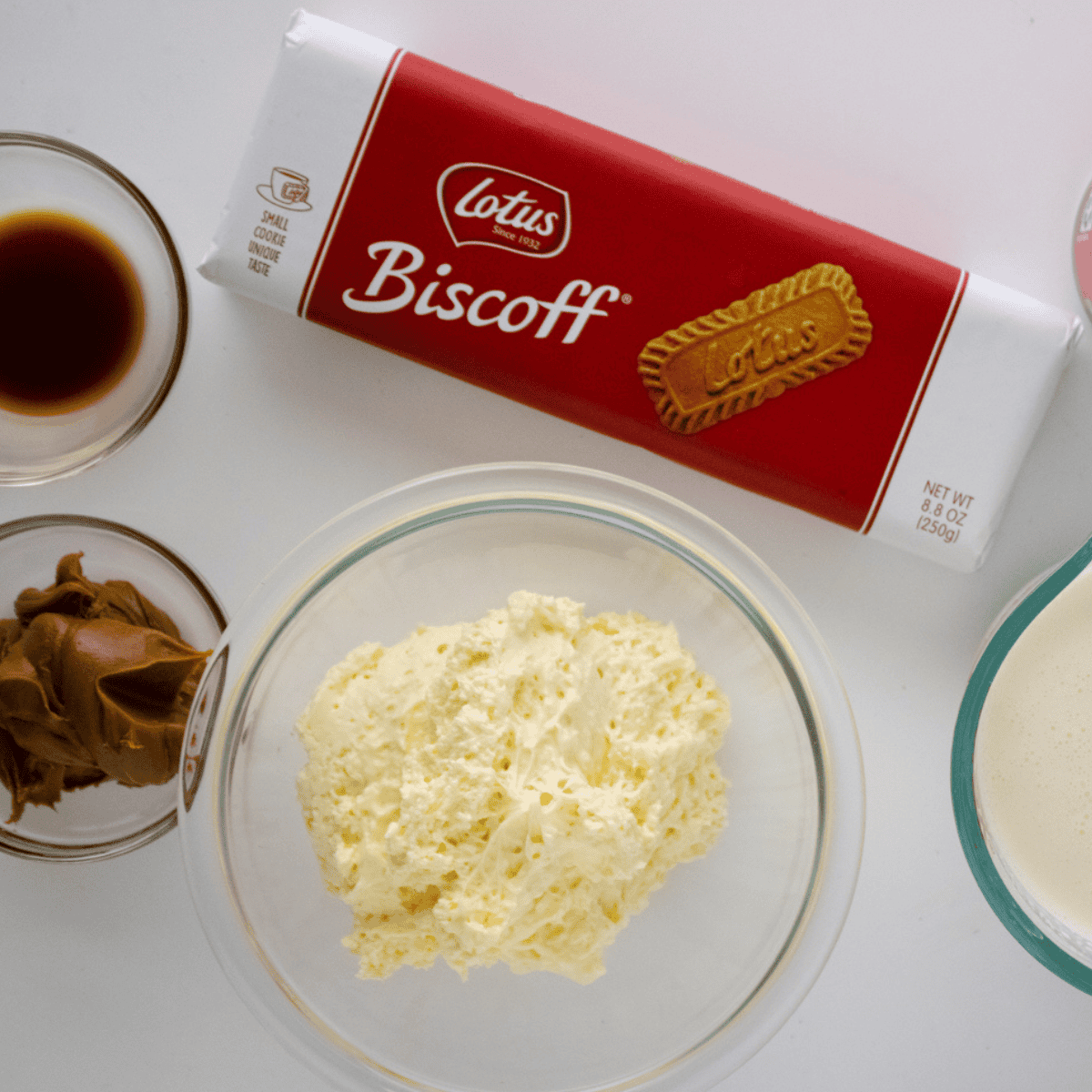 Ingredients needed for Easy Ninja Creami Cookie Butter Ice Cream on kitchen table.