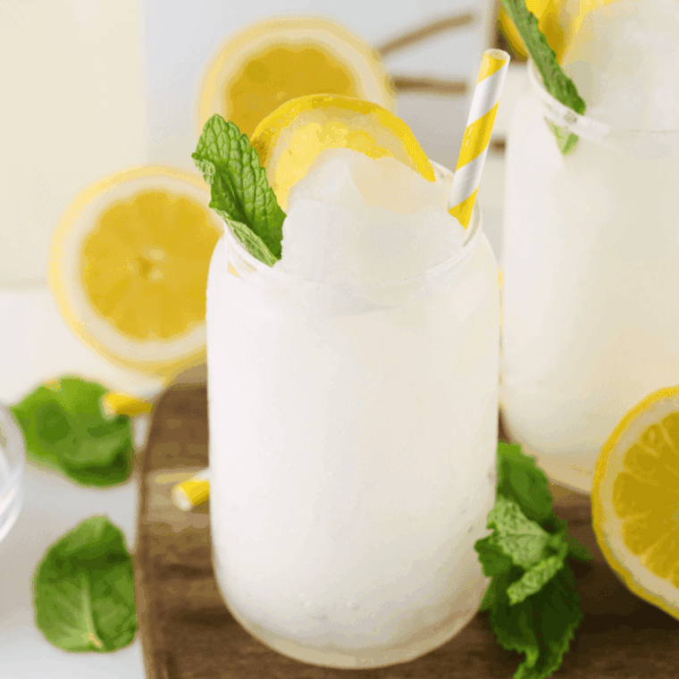 Frozen Ninja Creami lemonade slushi with icy texture in a clear glass
