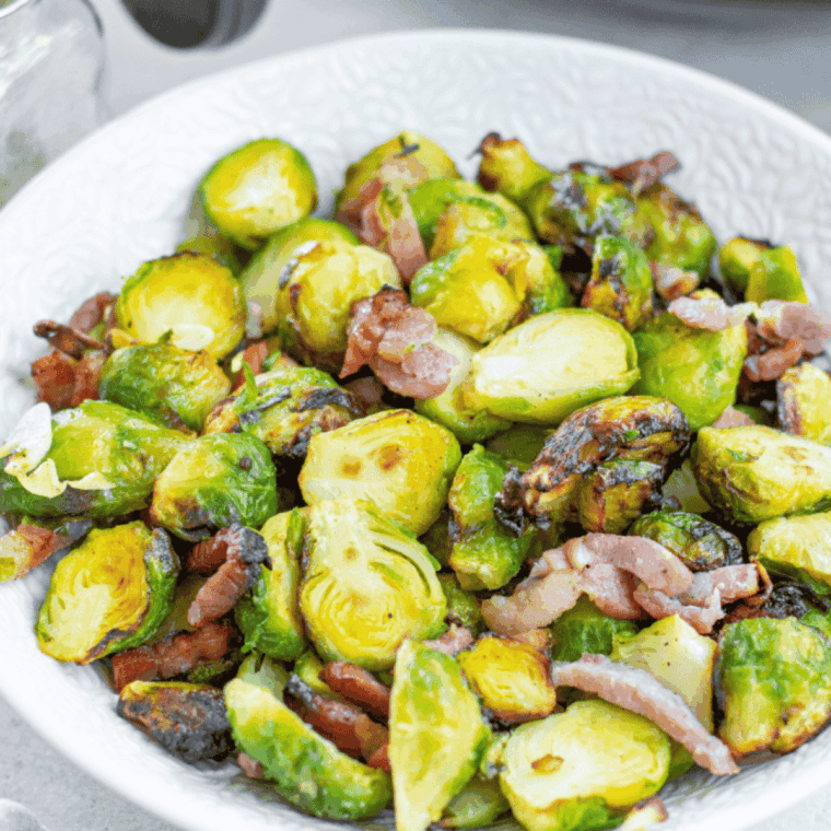 Golden, caramelized Copycat Bonefish Grill Brussels Sprouts served on a plate.