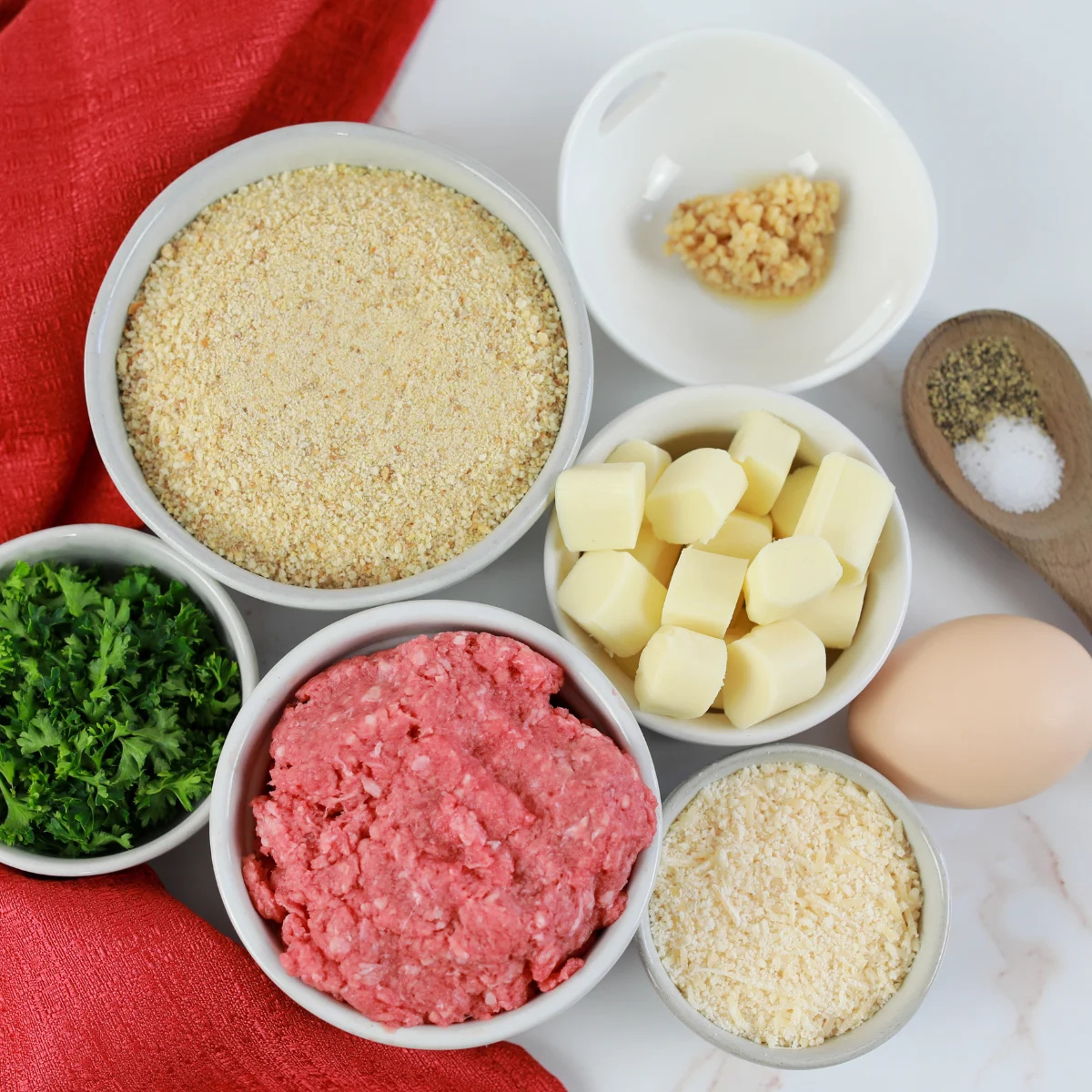 Ingredients for copycat Subway meatball subs including ground beef, breadcrumbs, Parmesan, egg and Italian seasonings