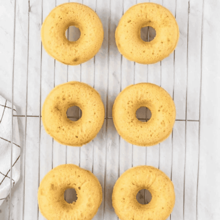 Baked air fryer protein donuts cooling in the silicone mold