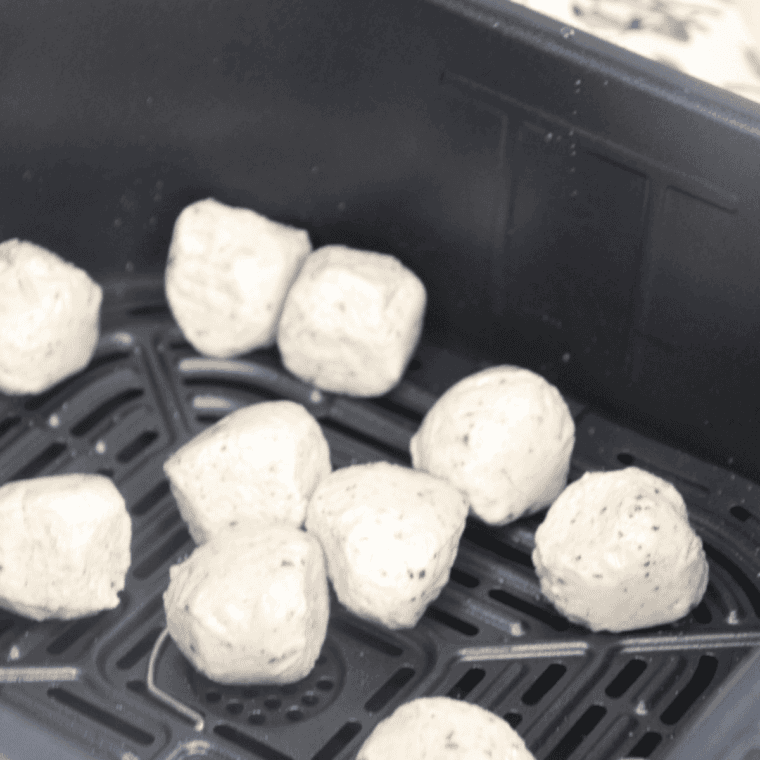 Trader Joe’s Chicken Meatballs in the air fryer basket.