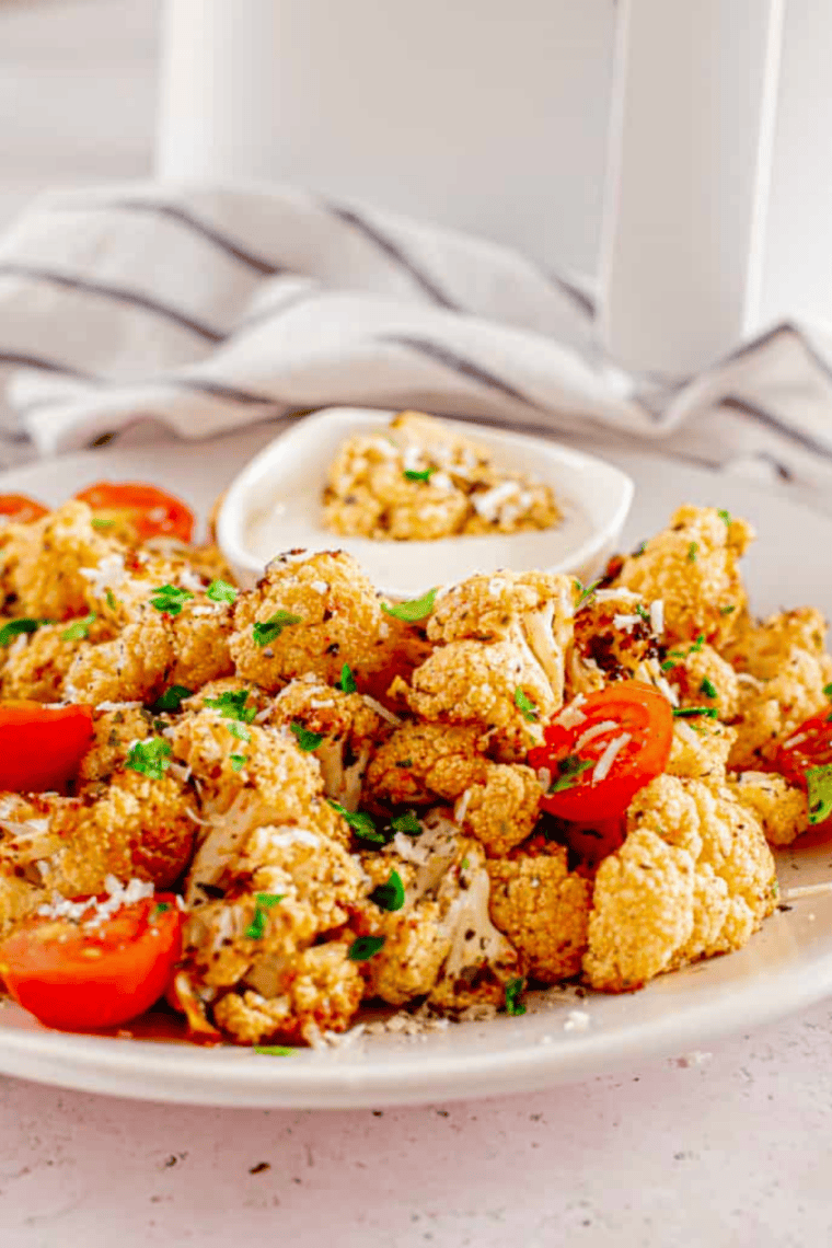 Ina Garten's Garlic-Roasted Cauliflower recipe – tender, flavorful, and easy roasted cauliflower with garlic and olive oil, perfect for a simple side dish.