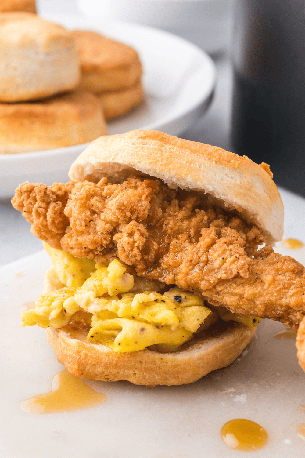 A baking sheet of freshly baked, tall Bojangles copycat biscuits with golden tops.