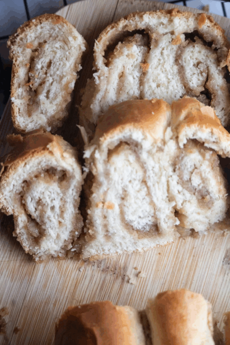 "Sliced air fryer povitica bread with swirled nut filling and golden crust."