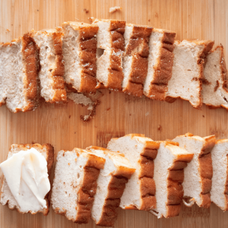 Golden-brown keto egg loaf fresh from the air fryer, sliced and ready to serve.