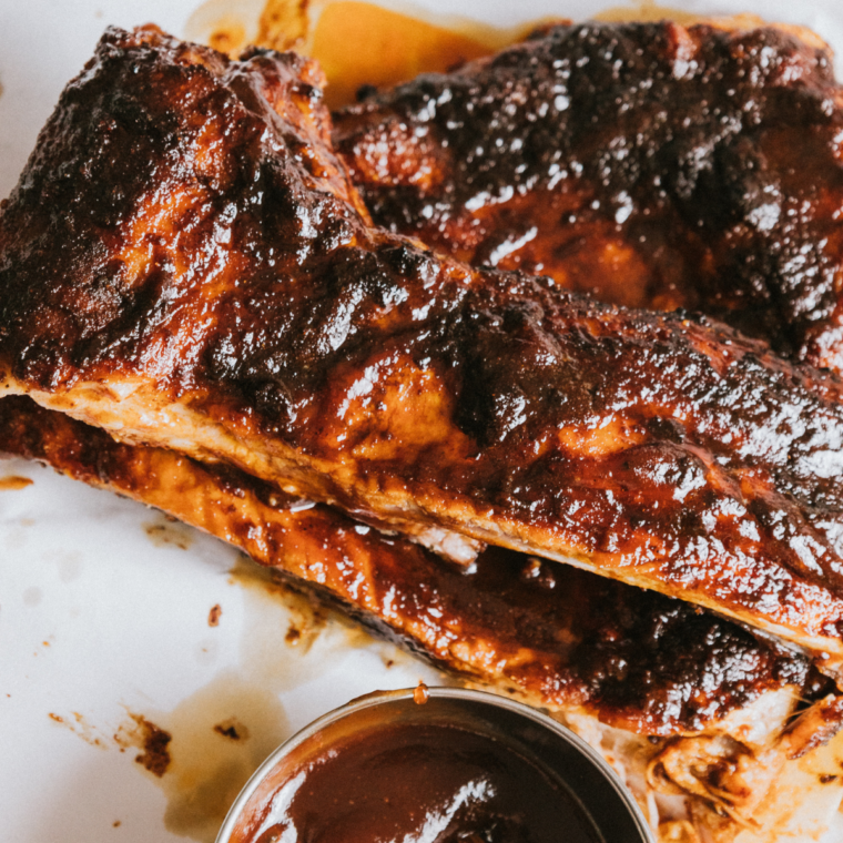 Juicy ribs cooked in a Ninja Foodi Grill with smoky bark and caramelized barbecue glaze.